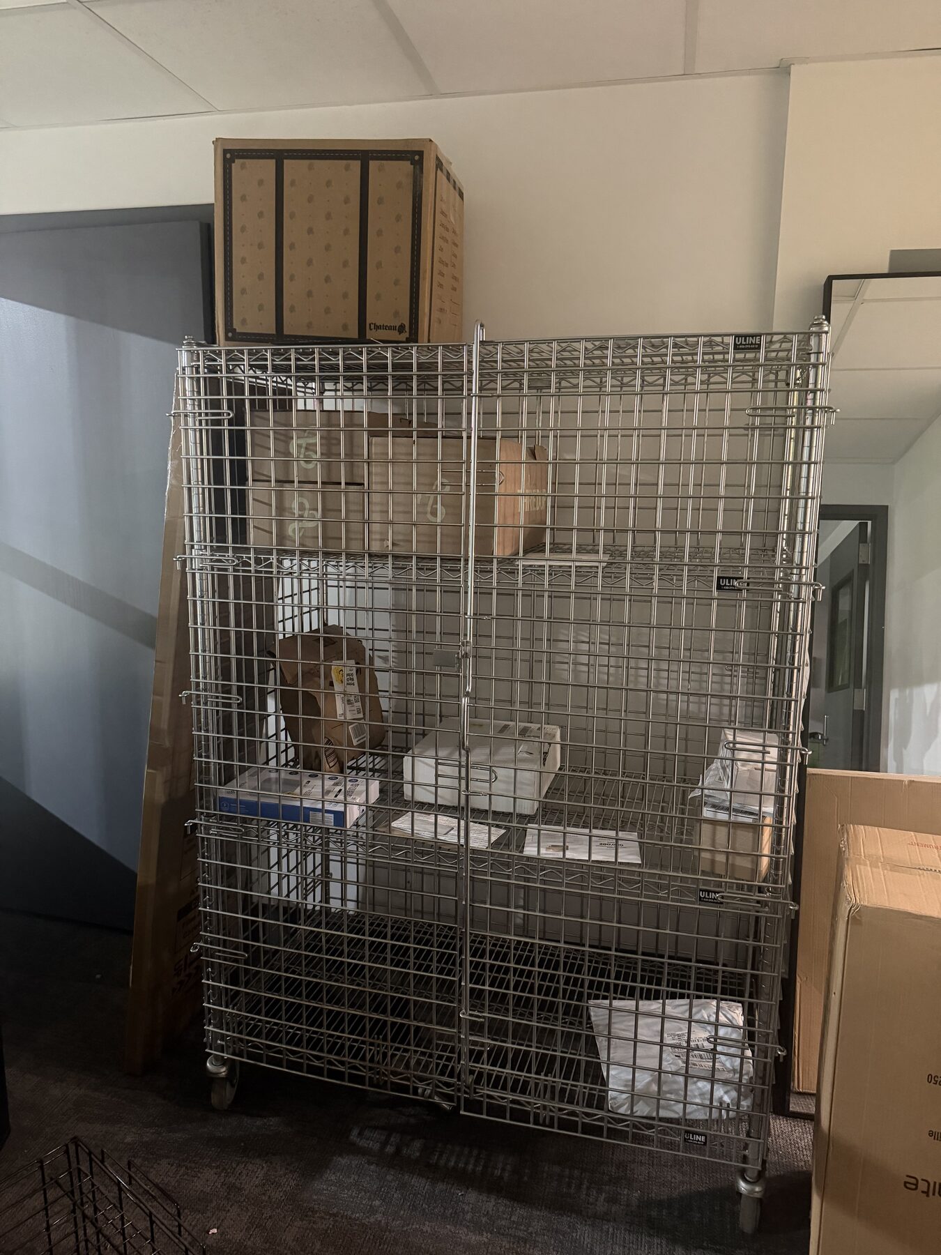 Open unit with road cases and wardrobe racks