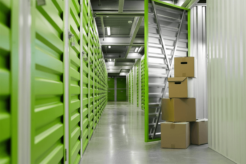 Secure storage units with individual door alarms